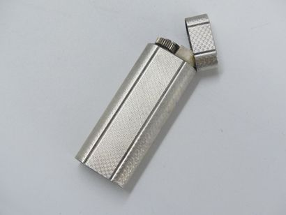 CARTIER. Lighter in silver plated metal,...