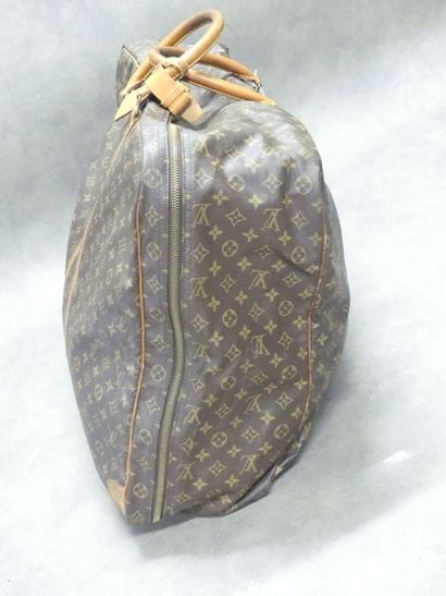 LOUIS VUITTON. Large soft suitcase in monogram...