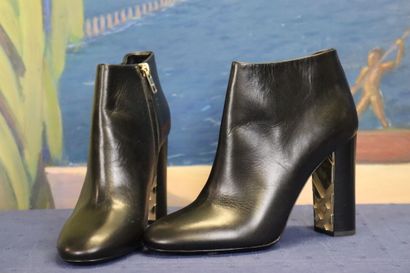 BURBERRY. Pair of black leather heeled boots,...
