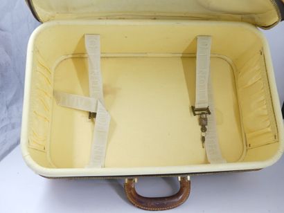 LOUIS VUITTON. Stratos semi-rigid suitcase...