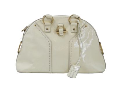 Yves Saint Laurent. Cream patent leather...