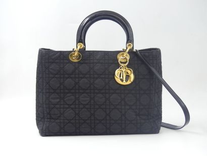 Christian Dior. Lady Dior handbag in black...