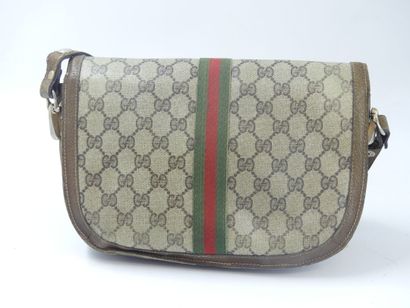 GUCCI. Shoulder bag in coated canvas and...