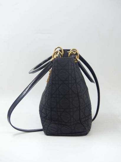 Christian Dior. Lady Dior handbag in black...