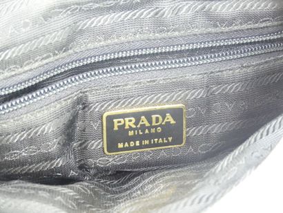 PRADA. Bag in lila quilted fabric, chain...