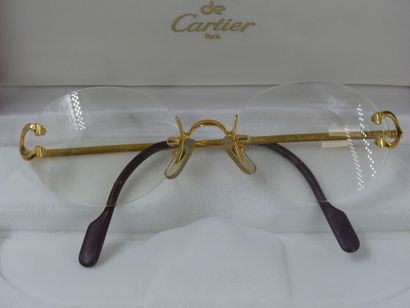 CARTIER, Must. Pair of eyeglasses with gold...