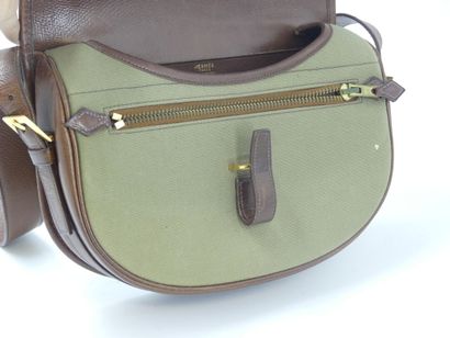 HERMES. Green canvas and leather golf ball...