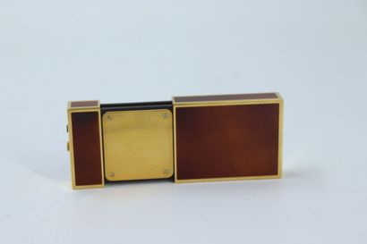DUPONT. Pocket alarm clock in gilded metal...