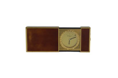 DUPONT. Pocket alarm clock in gilded metal...