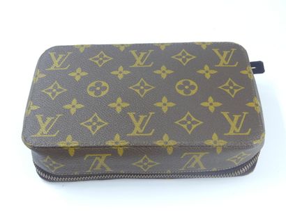 LOUIS VUITTON. Lot composed of a toiletry...