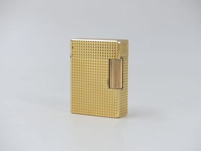DUPONT. Lighter in gilded metal, signed and...