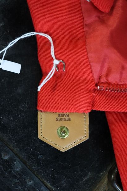 HERMES Paris. Red wool skirt, front closure...