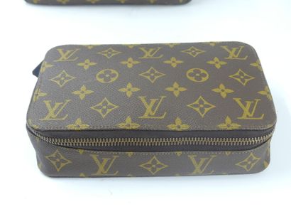 LOUIS VUITTON. Lot composed of a toiletry...