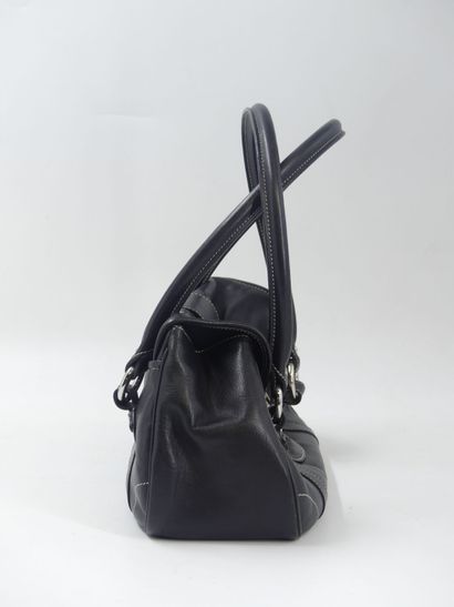 DIOR. Handbag in black calfskin, interior...