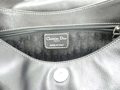 DIOR. Handbag in black calfskin, interior...