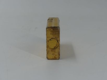 DUPONT. Lighter in gilded metal, monogrammed...