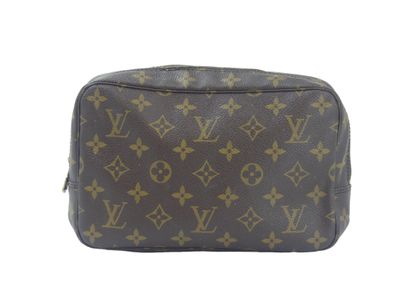 LOUIS VUITTON. Toilet bag in monogram canvas...
