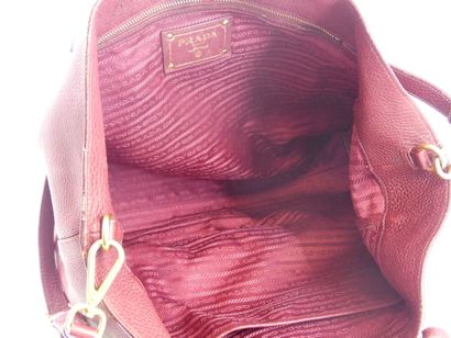 PRADA. Tote bag in dark red grained leather,...