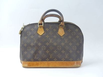 LOUIS VUITTON. Alma bag in monogram canvas...