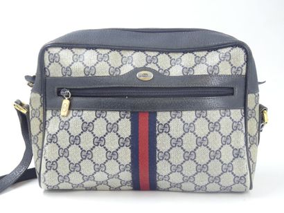 GUCCI. Shoulder bag in navy blue leather...
