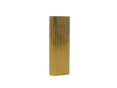 CARTIER. Lighter in gilded metal, signed...