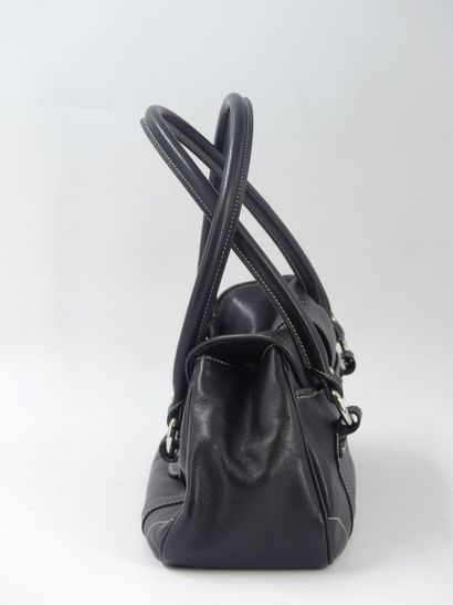 DIOR. Handbag in black calfskin, interior...