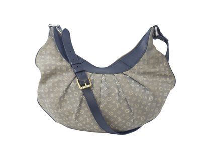LOUIS VUITTON. Shoulder bag in navy leather...