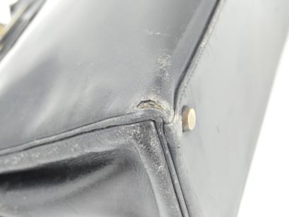 HERMES. Kelly bag 28cm in black box, gold...