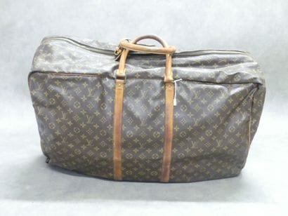LOUIS VUITTON. Large soft suitcase in monogram...