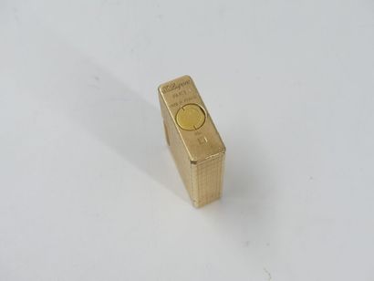 DUPONT. Lighter in gilded metal, signed and...