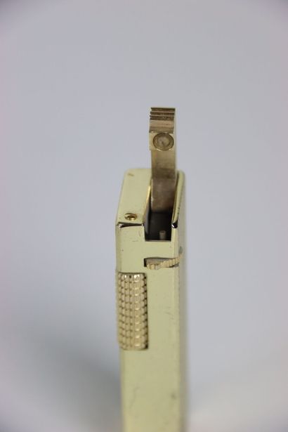 Gilded metal BRIQUET with quadrilles decoration,...