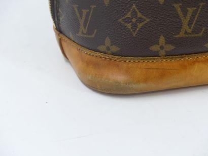 LOUIS VUITTON. Alma bag in monogram canvas...