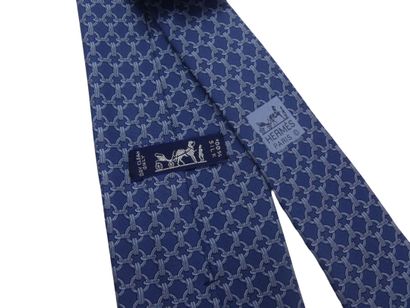 HERMES. Silk tie, navy blue background with...