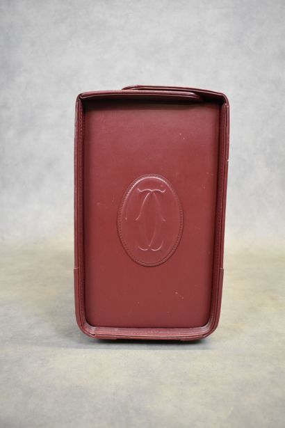 CARTIER. Must. Important briefcase in burgundy...
