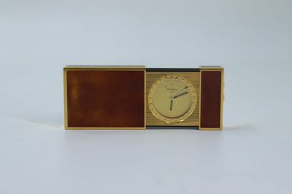 DUPONT. Pocket alarm clock in gilded metal...
