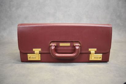CARTIER. Must. Important briefcase in burgundy...