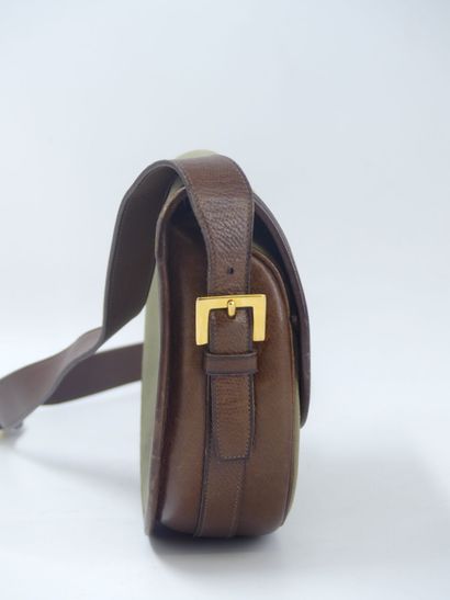 HERMES. Green canvas and leather golf ball...