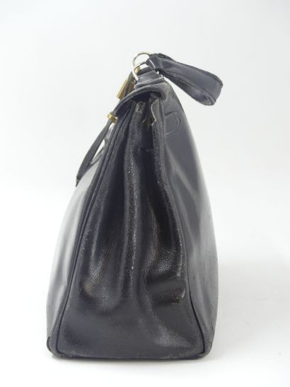 HERMES. Kelly bag 28cm in black box, gold...