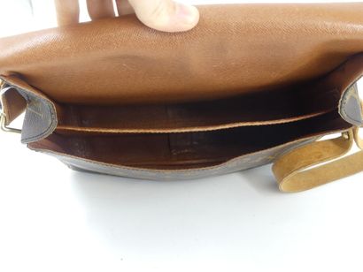 LOUIS VUITTON. Cartridge bag in monogram...