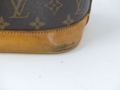 LOUIS VUITTON. Alma bag in monogram canvas...