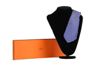 HERMES. Tie in its box, blue color with red...