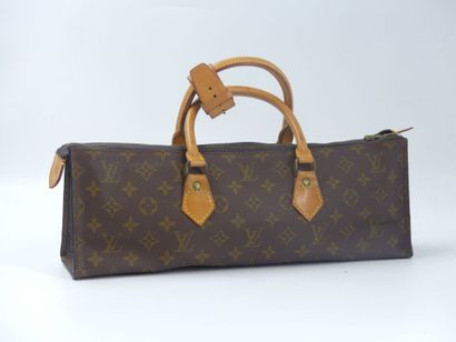 LOUIS VUITTON. Triangular bag in monogram...