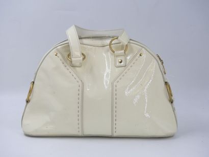Yves Saint Laurent. Cream patent leather...