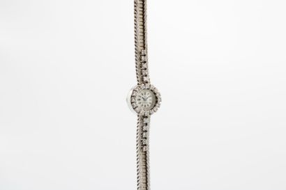 OMEGA
Lady's watch in white gold and platinum...