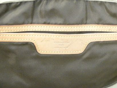 LOUIS VUITTON. Soft travel bag in monogram...