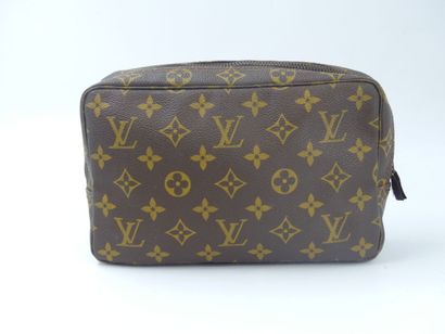 LOUIS VUITTON. Lot composed of a toiletry...