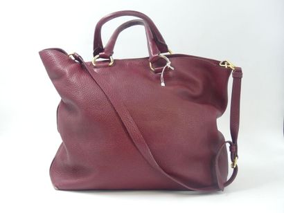 PRADA. Tote bag in dark red grained leather,...