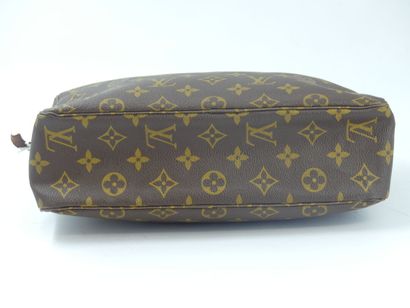 LOUIS VUITTON. Toilet bag in monogram canvas,...