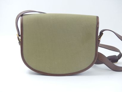 HERMES. Green canvas and leather golf ball...