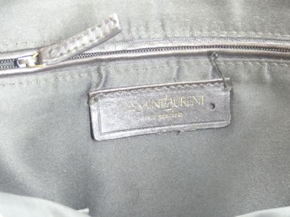 Yves Saint Laurent. Cream patent leather...